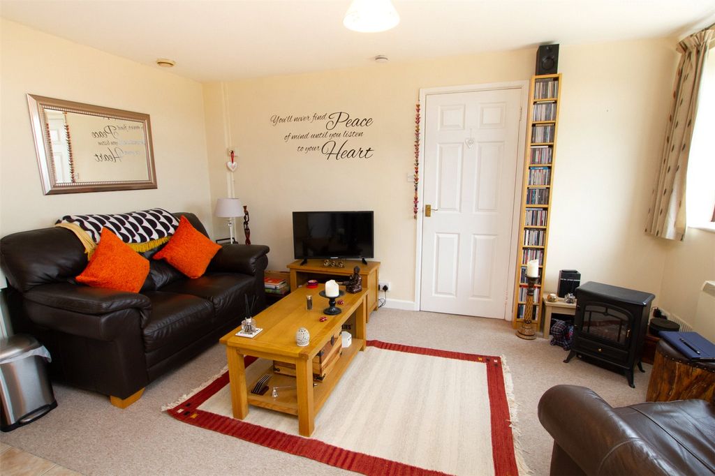 Property photo 3 of 8 Living Area