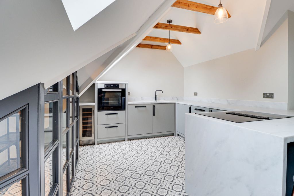 Property photo 3 of 16 Kitchen Area