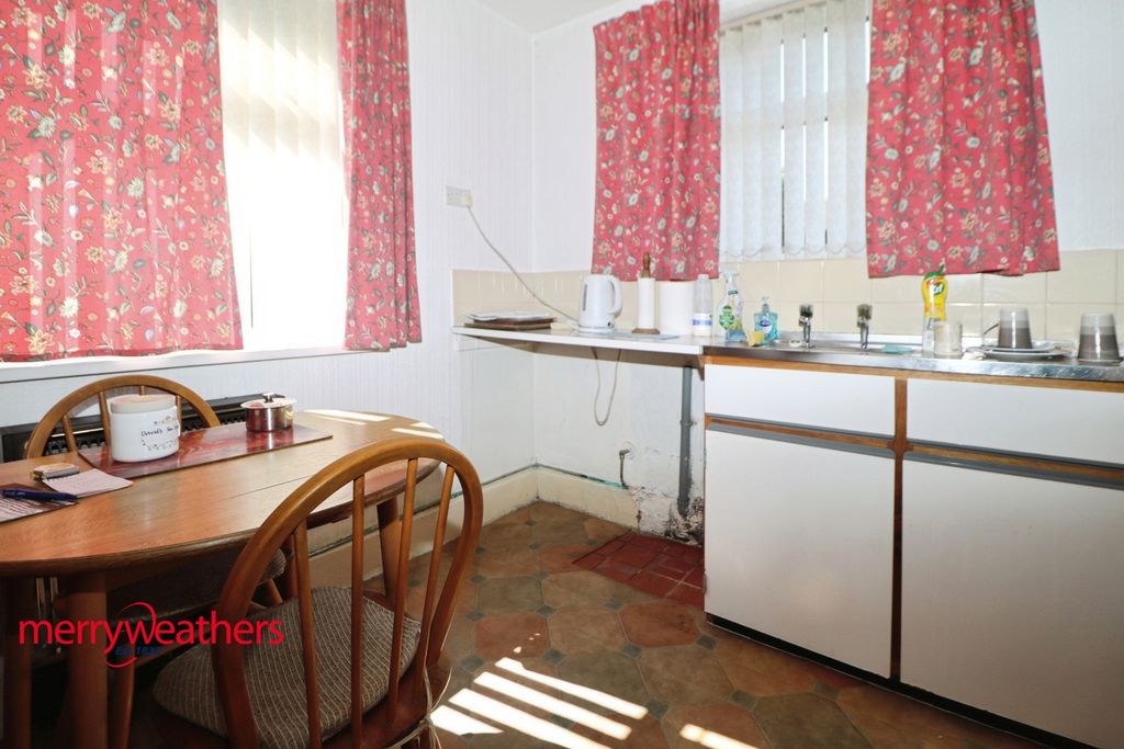 Property photo 3 of 7 Kitchen And Utility Room