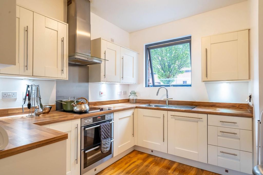 Property photo 3 of 13 Kitchen