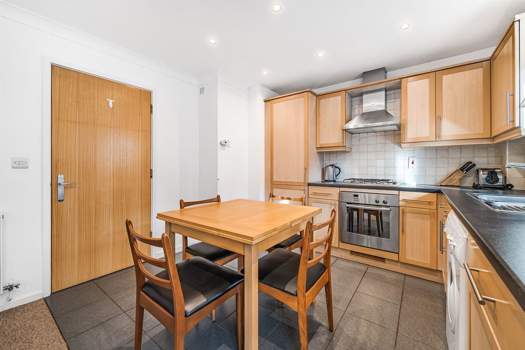 Property photo 3 of 9 Kitchen