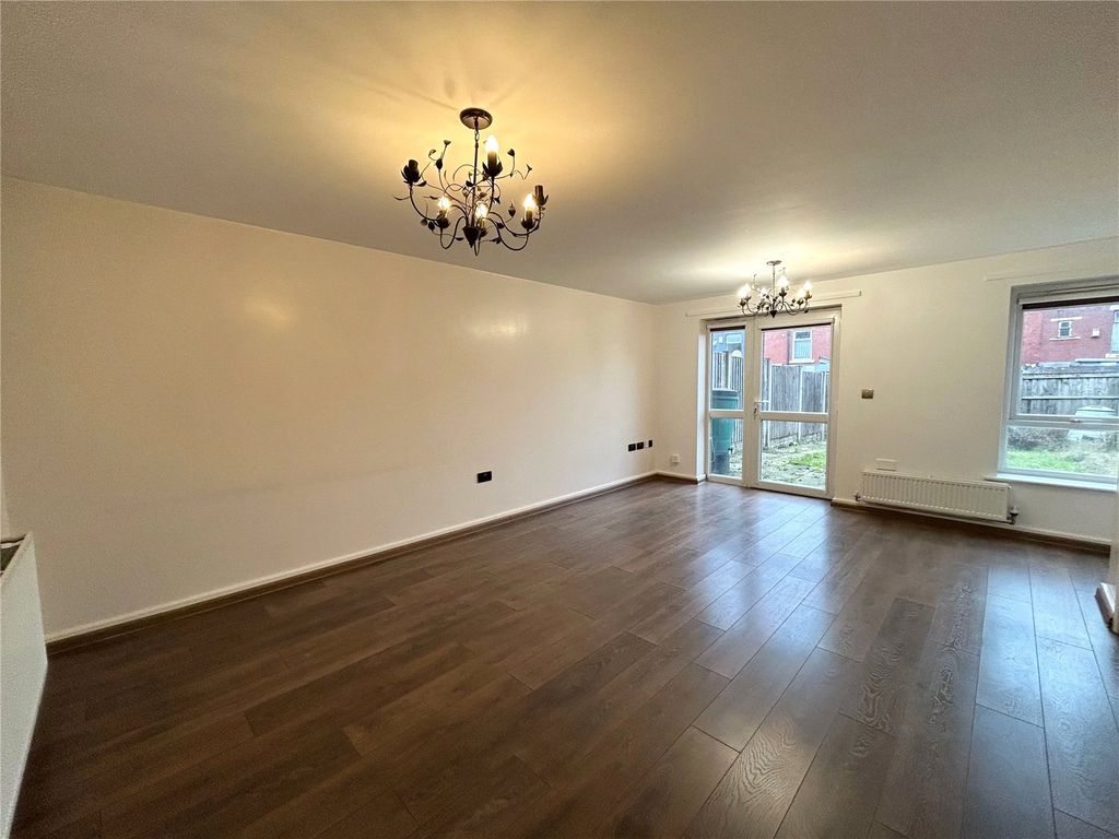 Property photo 3 of 12 Living Area