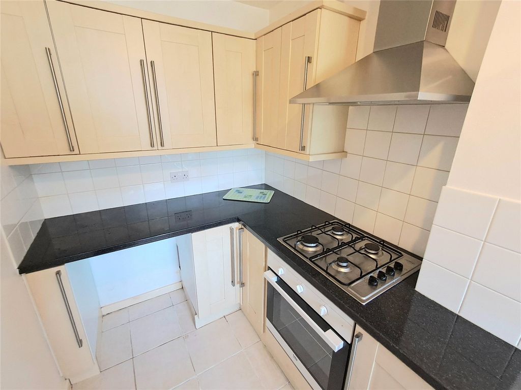 Property photo 3 of 12 Kitchen