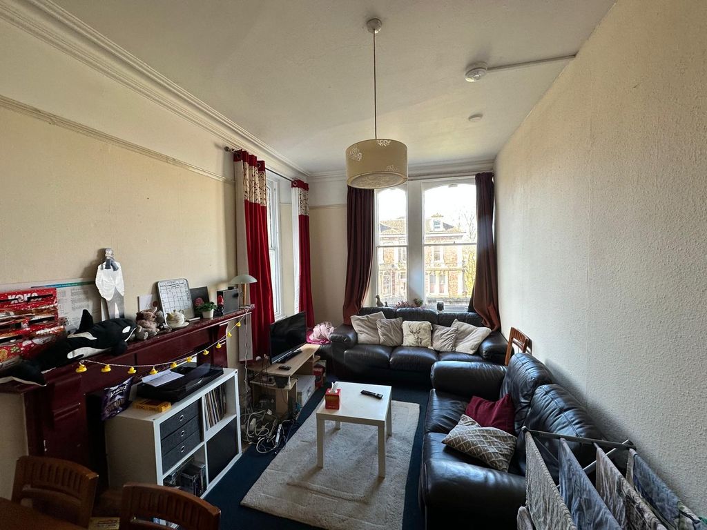 Property photo 2 of 17 Bright And Inviting Living Room Featuring A Spacio...