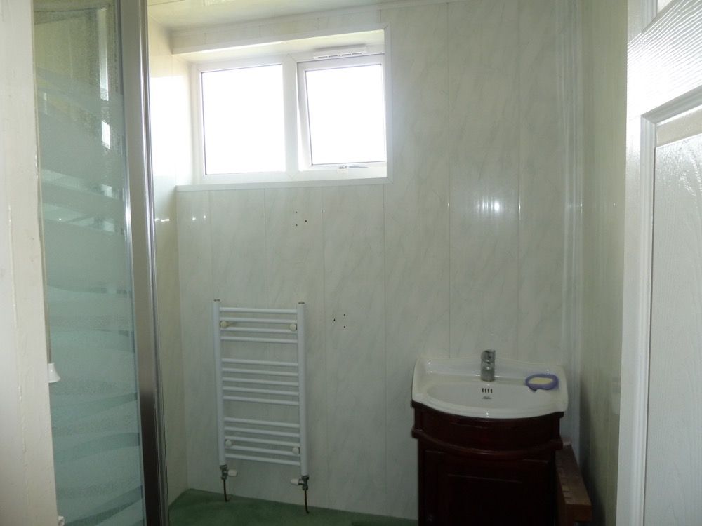 Property photo 3 of 8 Bathroom
