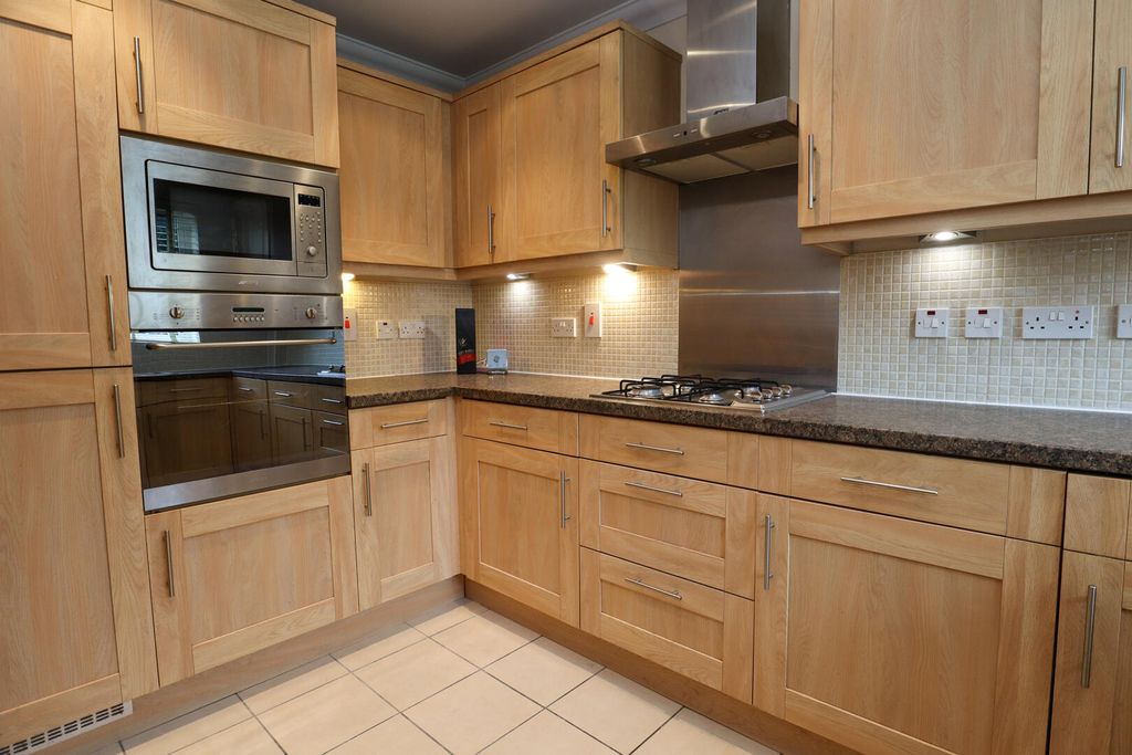 Property photo 2 of 12 Kitchen