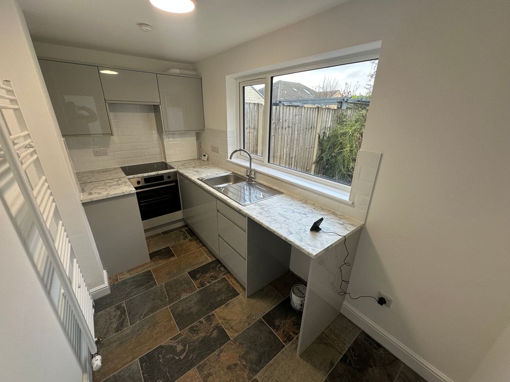 Property photo 3 of 8 Kitchen