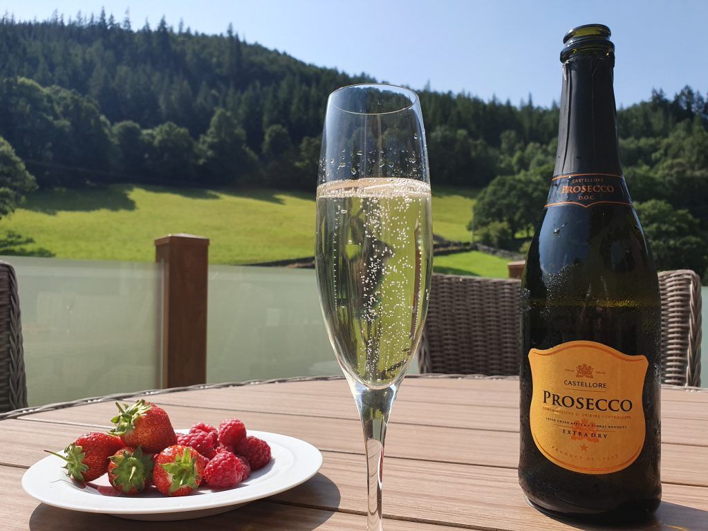 Property photo 2 of 4 Prosecco And Fresh Berries On The Lodge Decking Overlooking Gwydir Forest