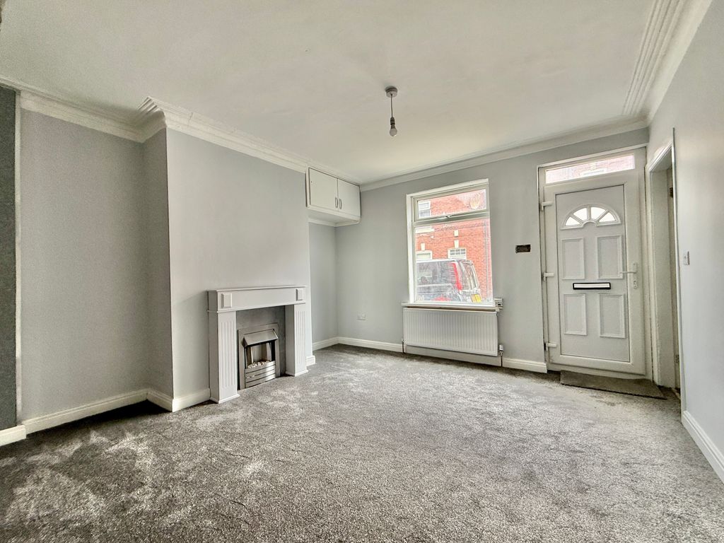 Property photo 3 of 12 Living Room