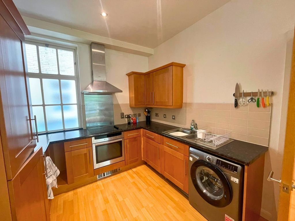 Property photo 3 of 8 Kitchen