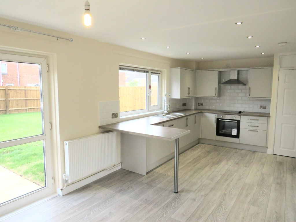 Property photo 2 of 12 Kitchen