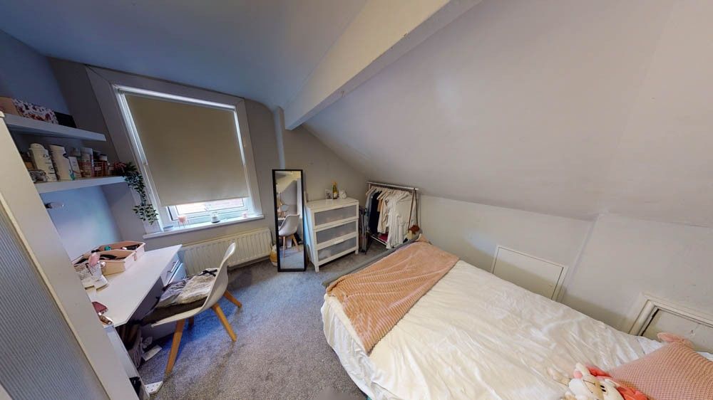 Property photo 1 of 8 Bright And Cozy Bedroom Featuring A Single Bed, De...