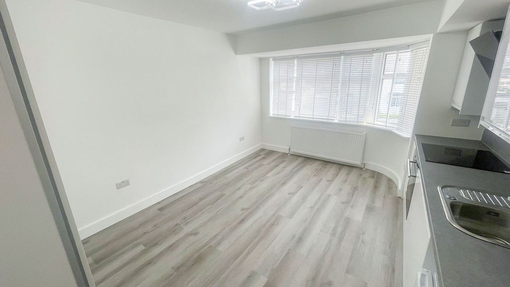 Property photo 2 of 4 Bright And Modern Kitchen Area With Light Wood Flo...