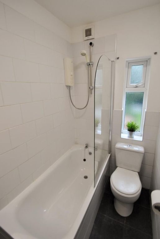 Property photo 3 of 15 Bright And Clean Bathroom Suite Featuring A White ...