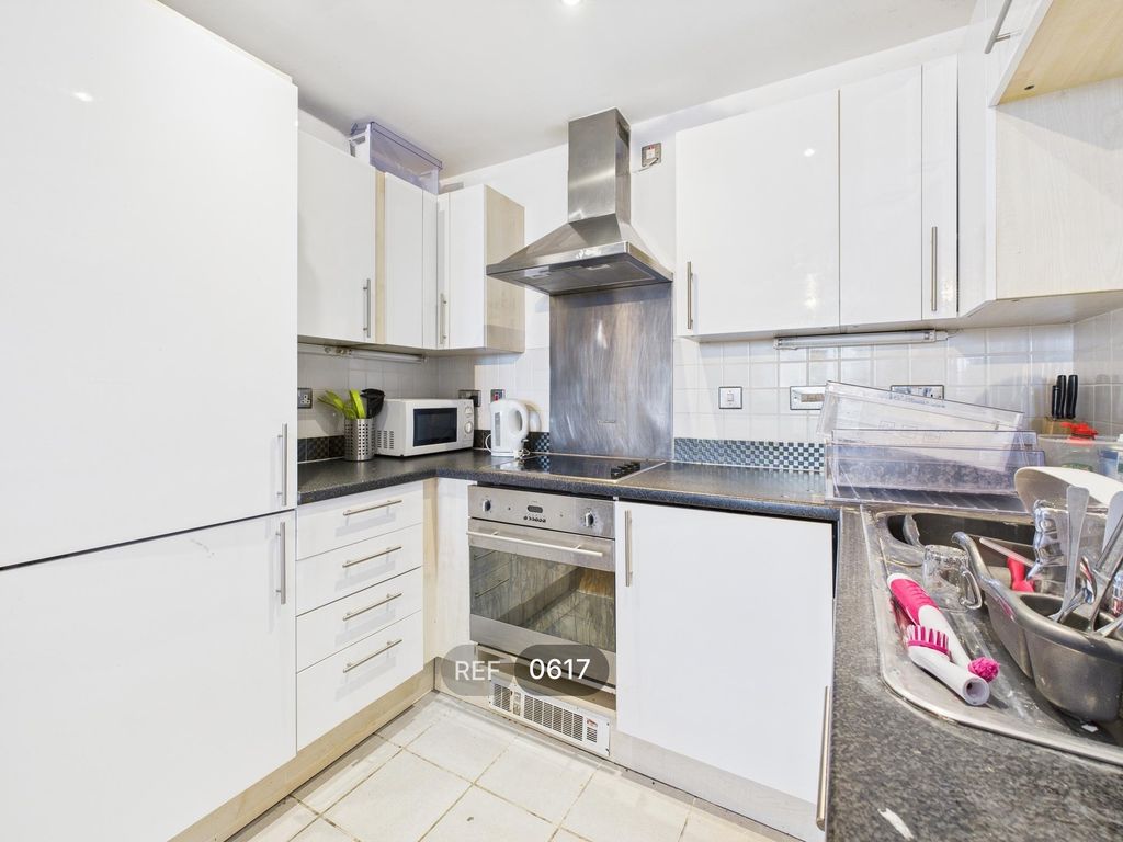 Property photo 3 of 16 Kitchen & Living Area