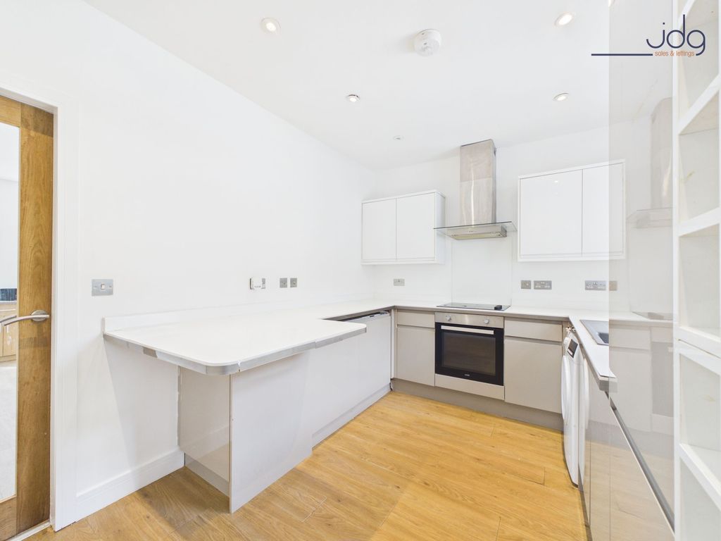 Property photo 3 of 12 Kitchen With Breakfast Bar