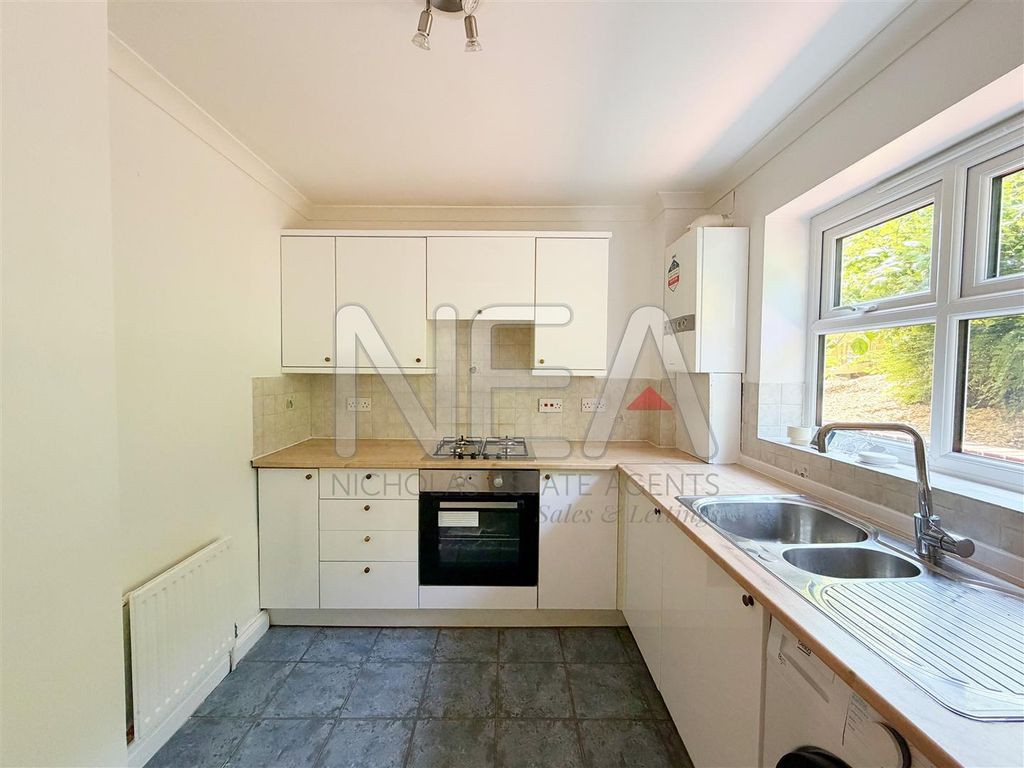 Property photo 3 of 16 Kitchen