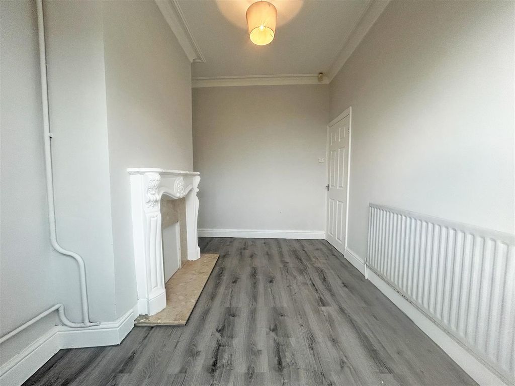 Property photo 3 of 12 Living Room