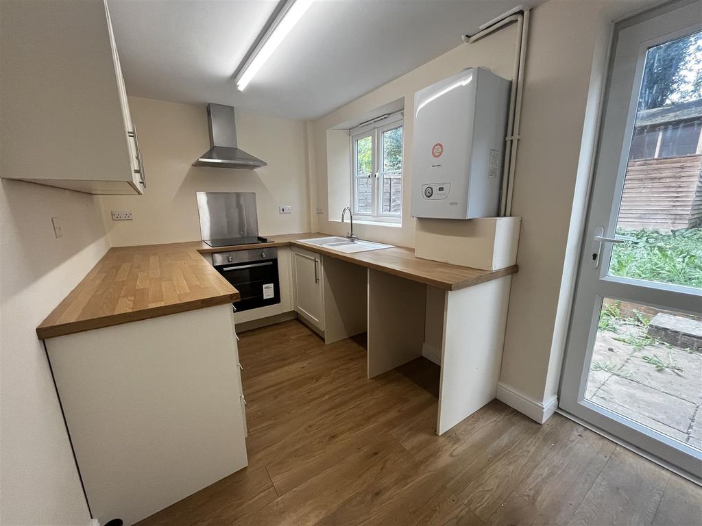 Property photo 3 of 12 Kitchen (1/2)
