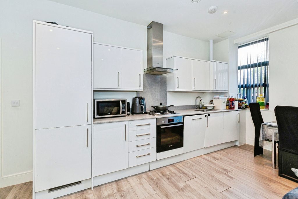 Property photo 2 of 12 Kitchen Area
