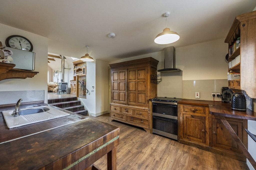 Property photo 3 of 17 Kitchen Area