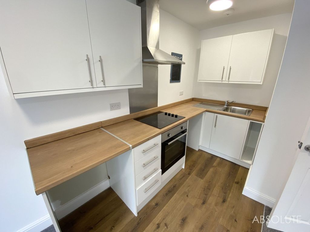 Property photo 3 of 12 Kitchen Area