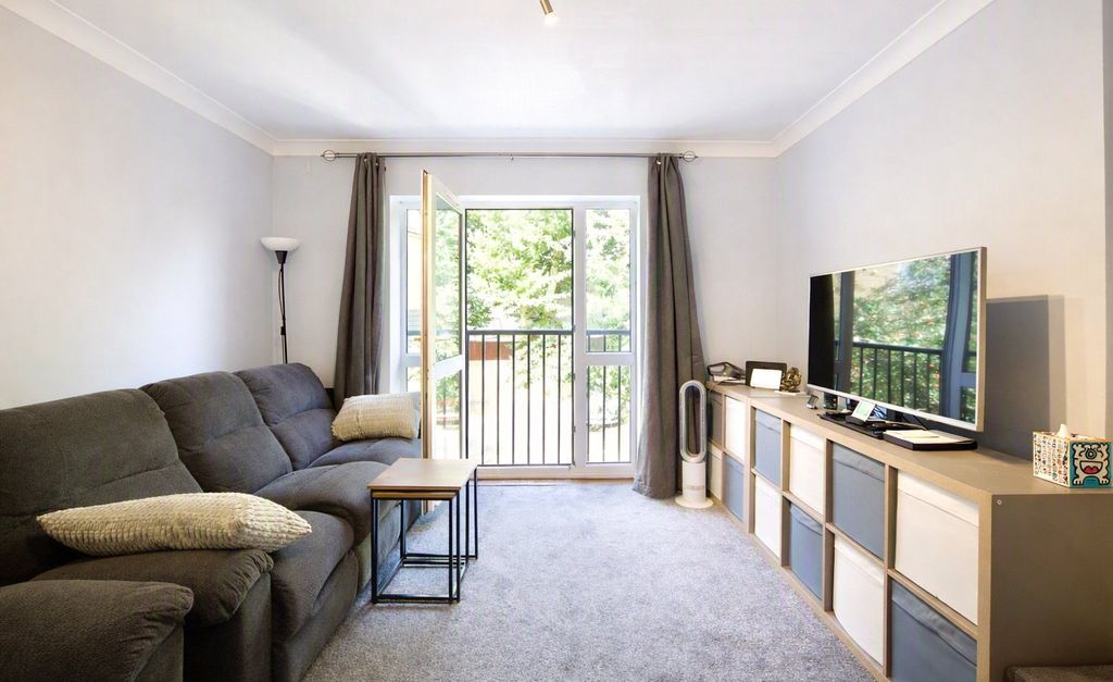 Property photo 3 of 16 Living Area