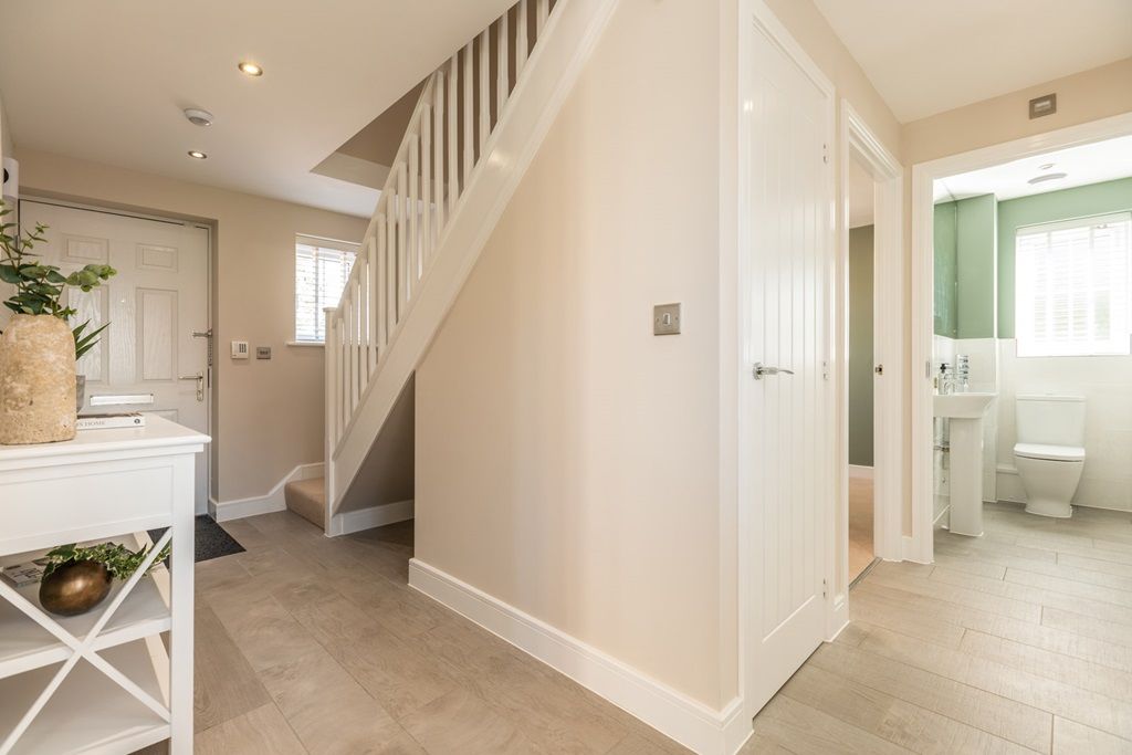 Property photo 2 of 12 Hallway With Convenient Storage Cupboard