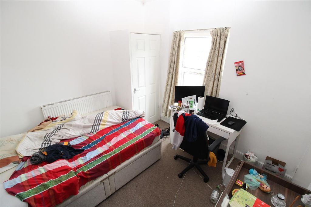 Property photo 3 of 4 Bright Bedroom With Built-In Storage And Desk...