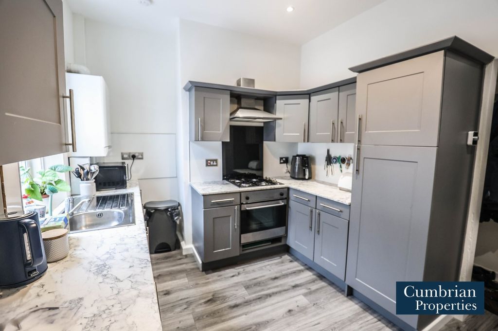 Property photo 2 of 13 Dining Kitchen