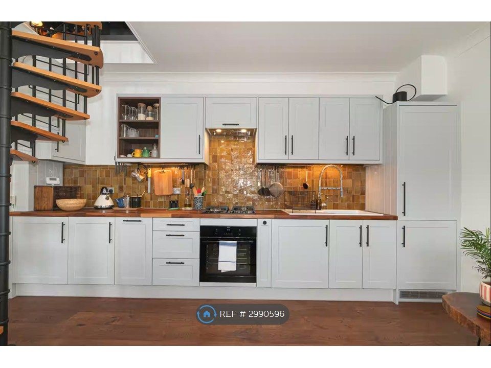 Property photo 3 of 12 Downstairs Kitchen