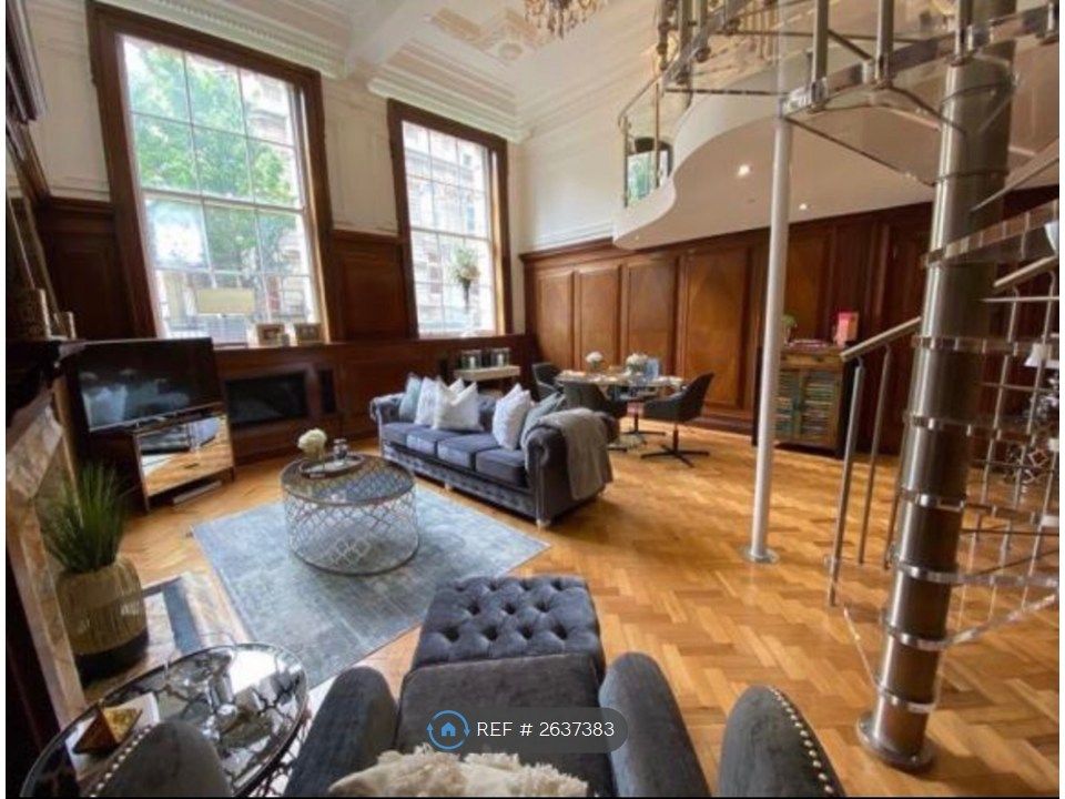 Property photo 1 of 12 Living Area