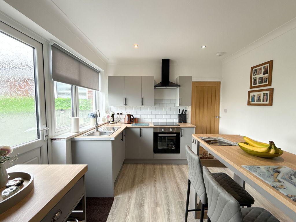 Property photo 2 of 12 Kitchen