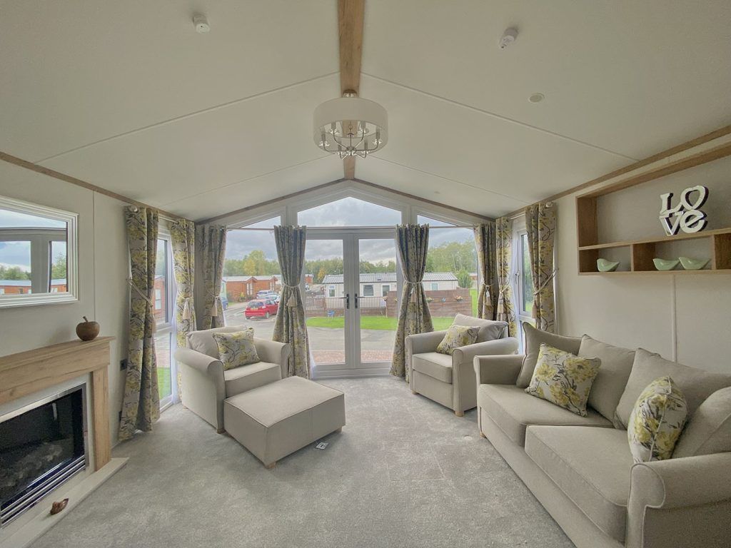 Property photo 2 of 12 Bright Lounge With Vaulted Ceiling And Front Patio Doors