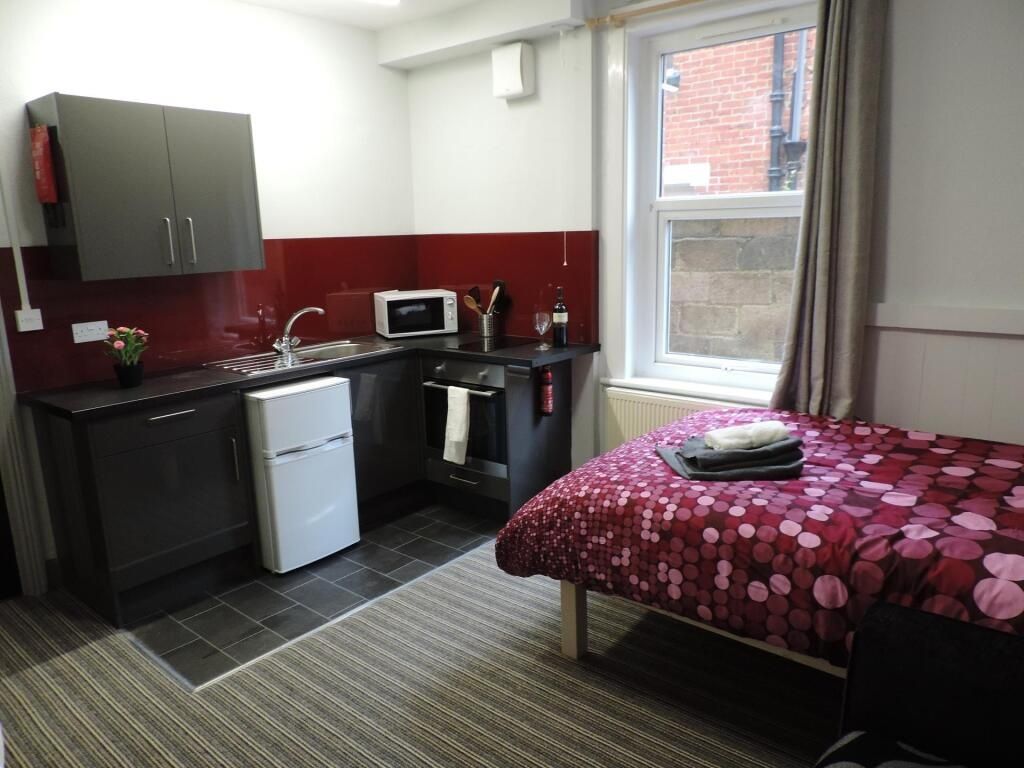 Property photo 1 of 4 Modern Studio With A Sleek Kitchenette Area...