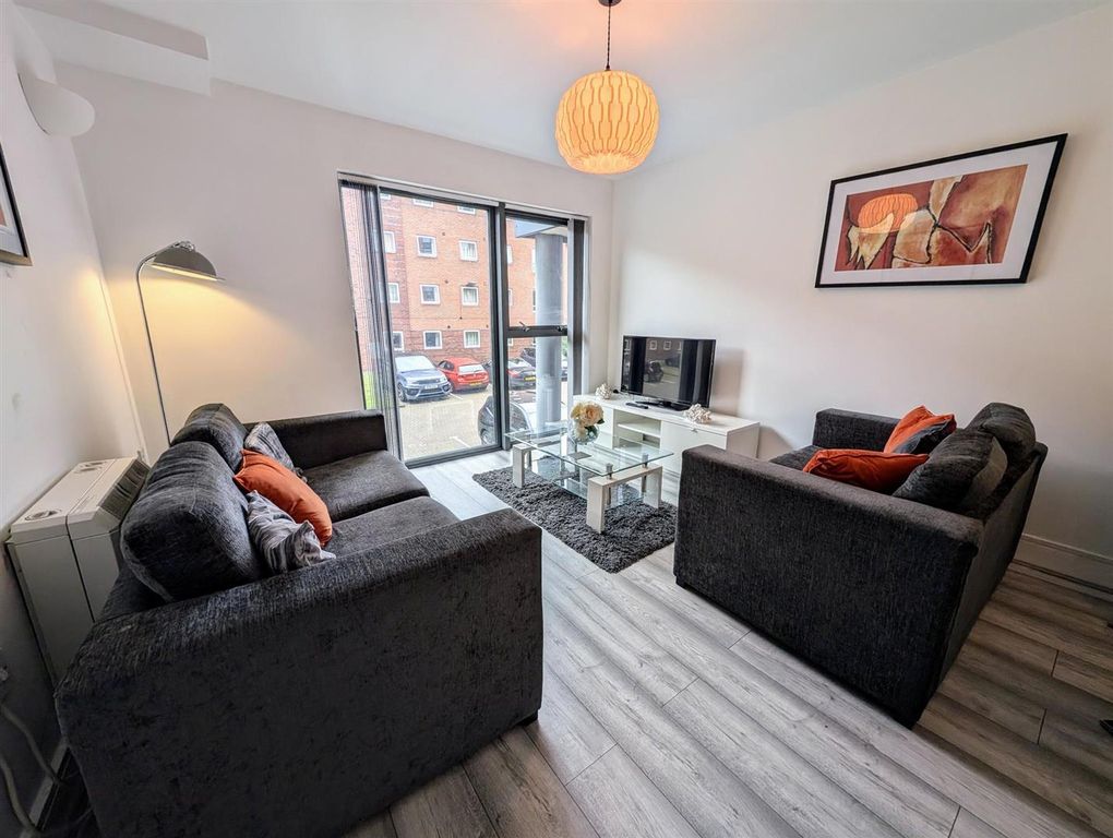 Property photo 2 of 11 Living Roomjpg