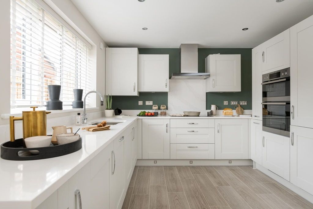 Property photo 3 of 16 Beautifully Designed Kitchen With Ample Storage And Worktop Space