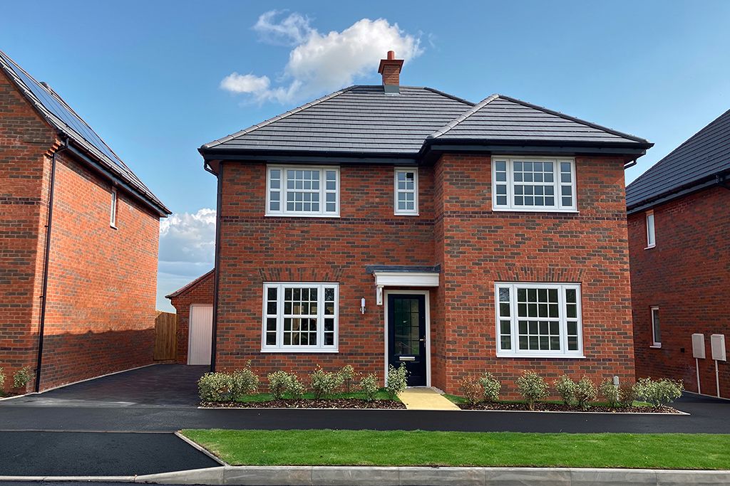 Property photo 1 of 10 A Two-Story Brick House With A Tiled Roof
