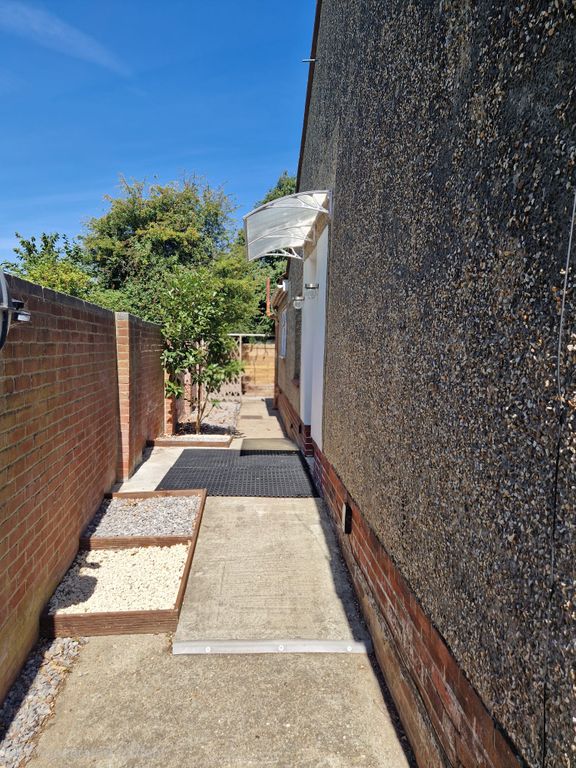 Property photo 3 of 13 Front Walkway