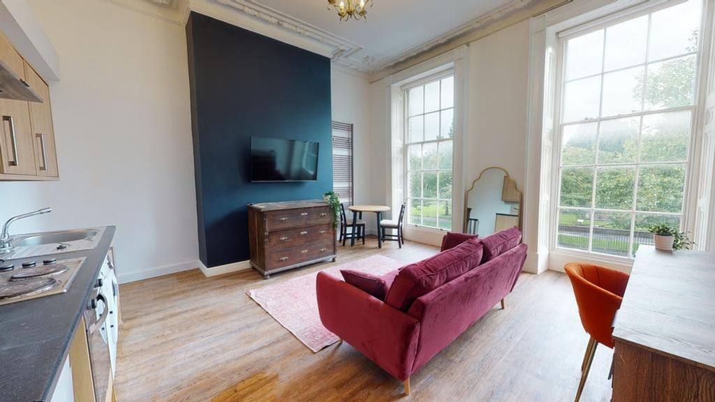 Property photo 2 of 4 A Spacious And Bright Modern Living Room Featuring...