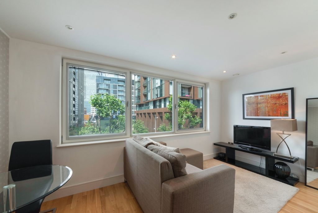 Property photo 1 of 8 Living Area