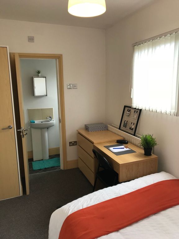 Property photo 3 of 14 A Cozy Double Bedroom Featuring A Comfortable Bed,...