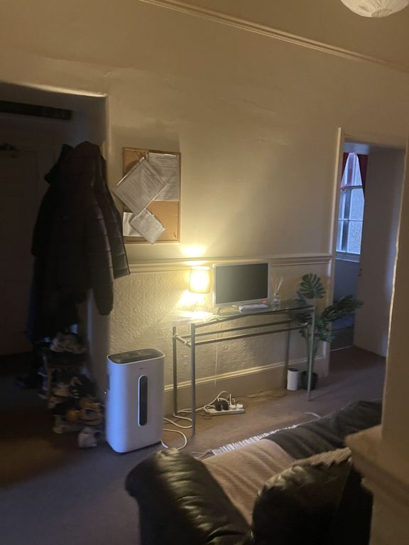 Property photo 2 of 4 Cosy Living Area With A Leather Sofa, Console Tabl...