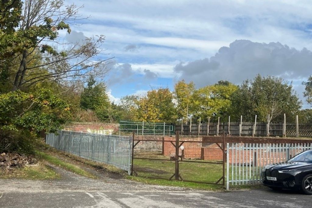 Property photo 3 of 4 A Large Plot Of Land, With Fencing Around It.