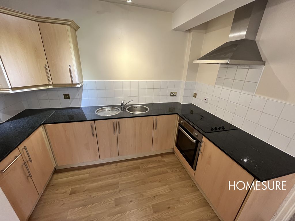 Property photo 3 of 7 Kitchen