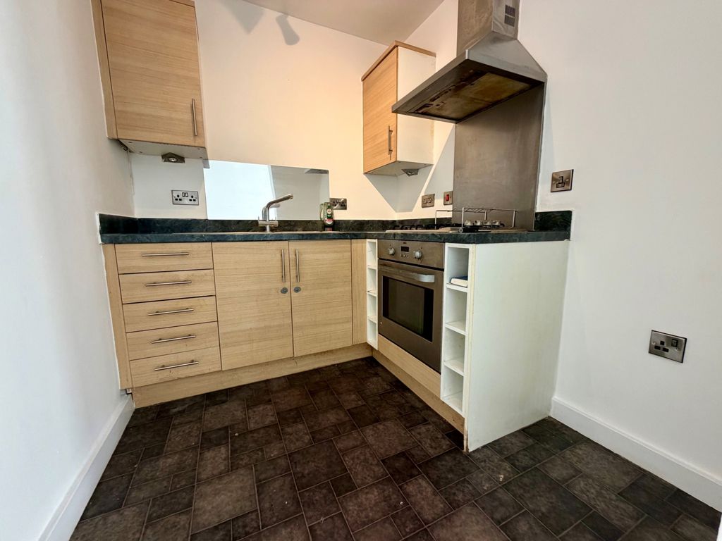 Property photo 3 of 8 Kitchen