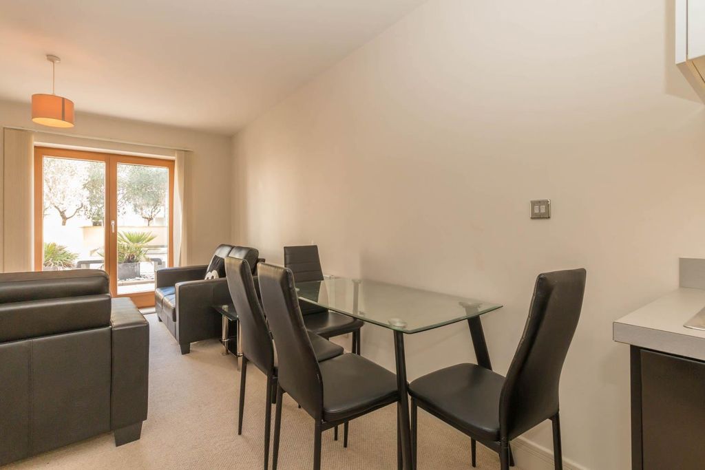 Property photo 3 of 7 Living Area/ Dining Area