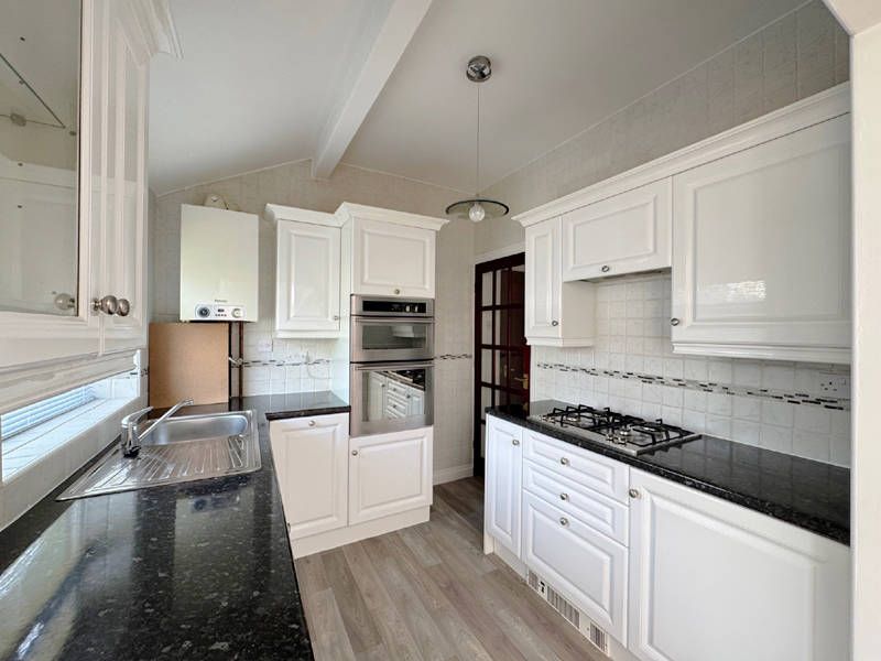 Property photo 3 of 24 Kitchen
