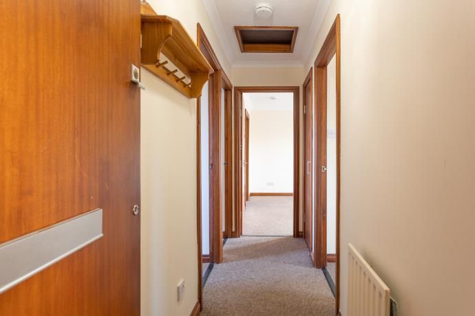 Property photo 3 of 12 Internal Hallway After Coming Through Flat Door