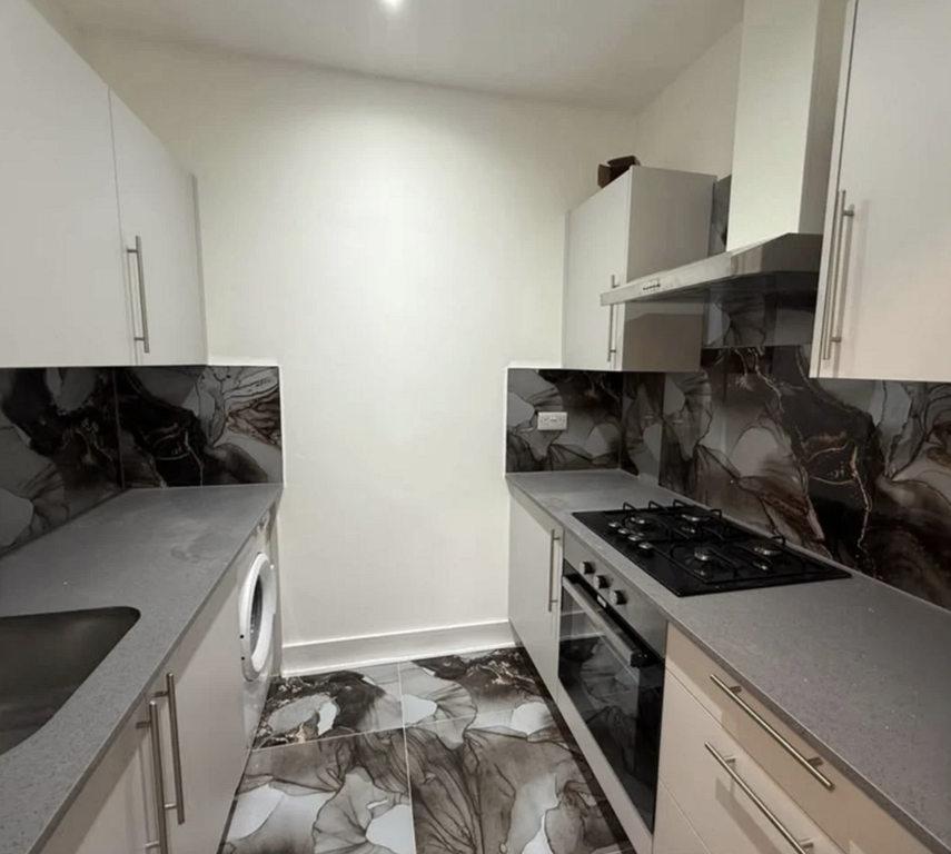Property photo 1 of 7 Kitchen